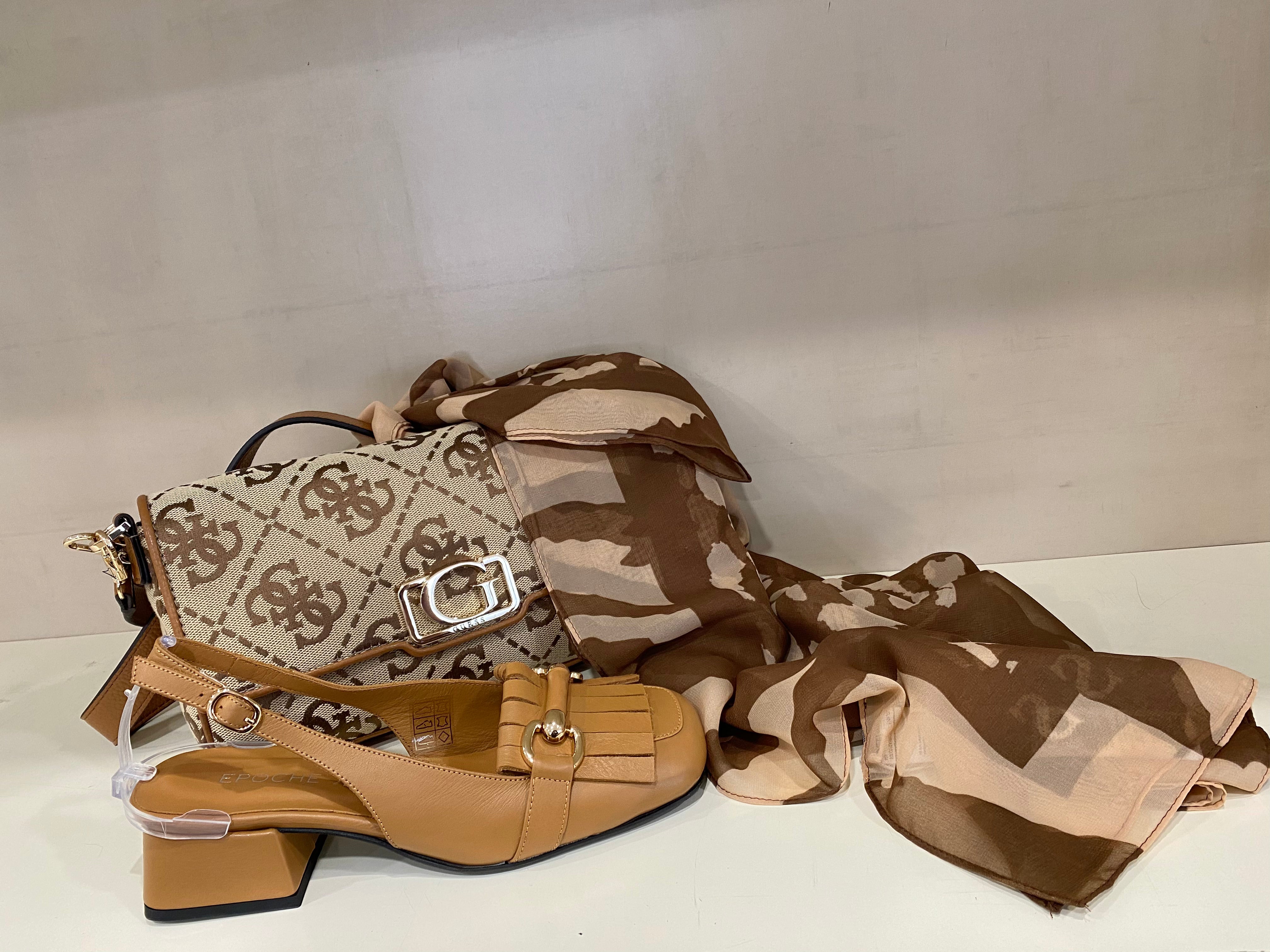 Epochè XI Venice 70 slingback donna a tacco medio in pelle cuoio con morsetto oro e frangie